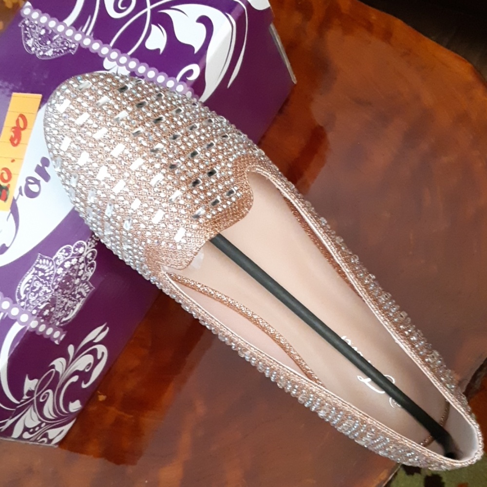 New. Rose Gold flats ,size 7.5